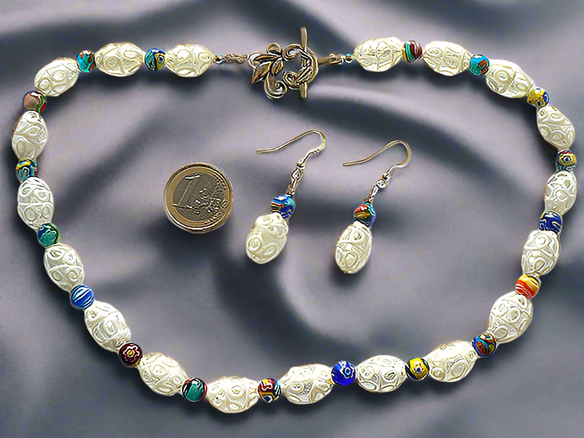 parure verre dentelle blanche avec millefiori