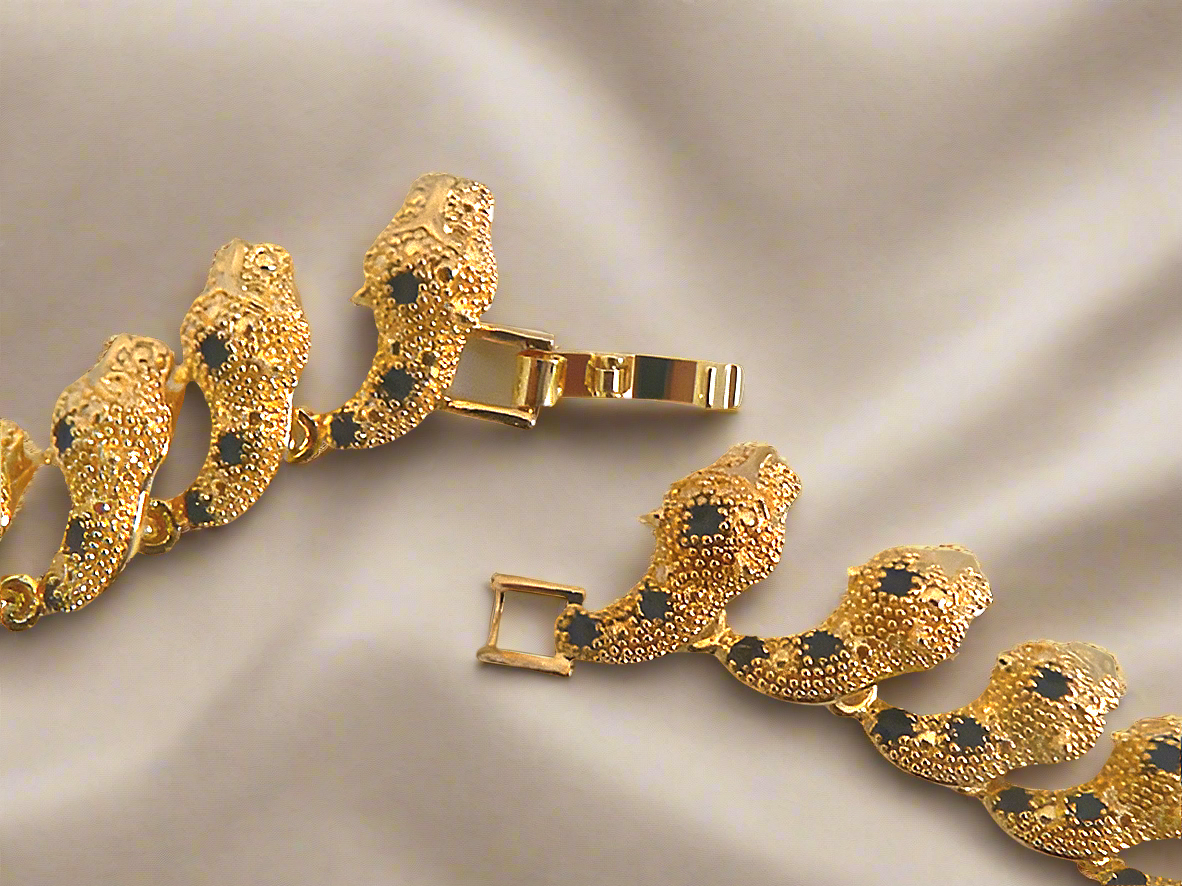 Parure panthère dorée aux yeux zirconia rubis