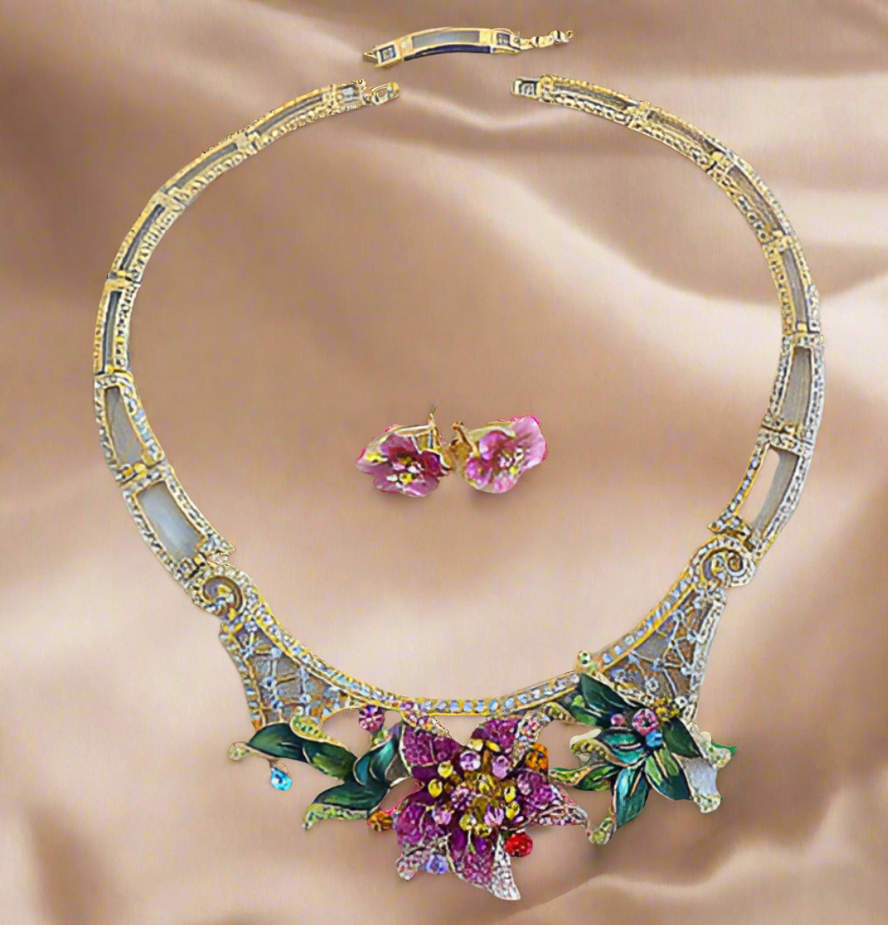 Parure avec grande fleur rose strass et émail