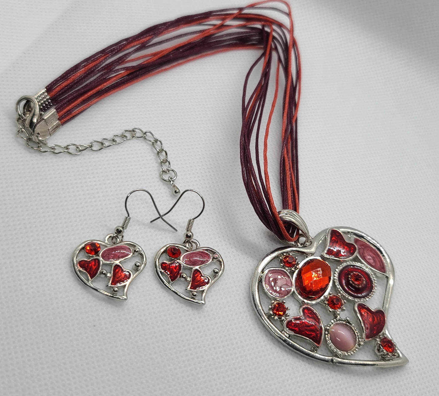 Enamel and rhinestone heart-shaped pendant with matching loops P334