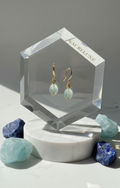 Boucles d'oreille en Aigue-Marine Facettée – Monture Dorée | NACRELUNE