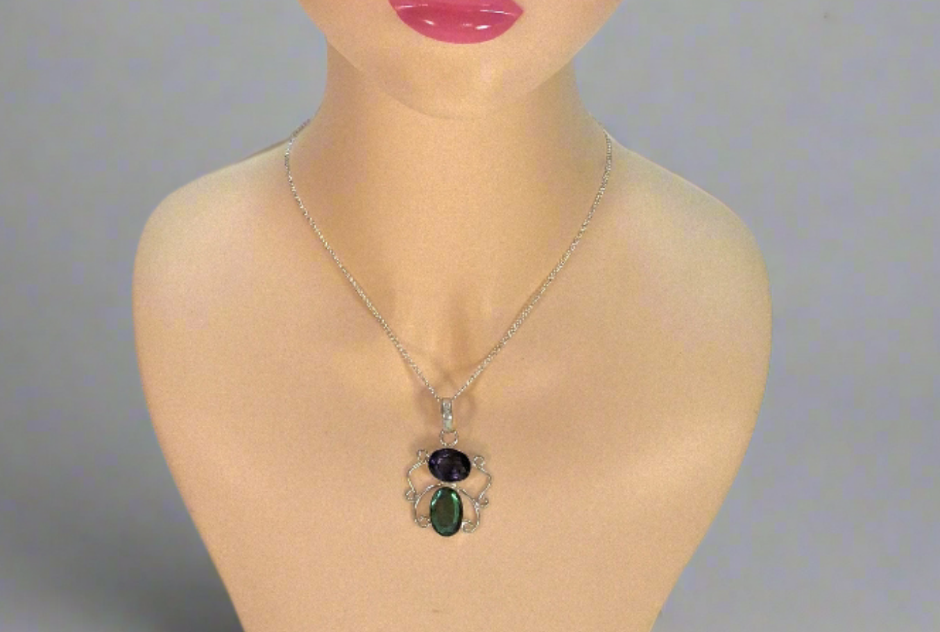 Pendentif en argent avec améthyste et topaze mystique taillées