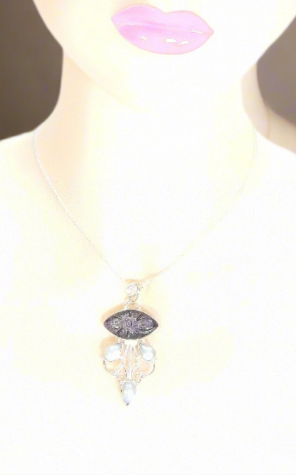 Pendentif argent 925 et pierre de soleil sculptée