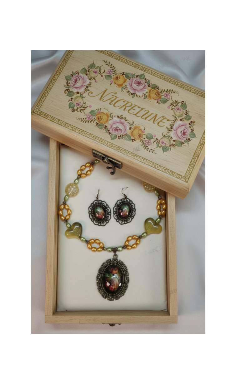 Jewelry set in genuine cultured pearls and acrylic beads with a glass cameo depicting flowers