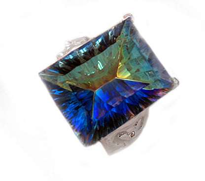 Silver ring with blue “mystic” treated topaz R48