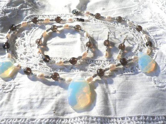 Quartz and faceted opalite set SE11