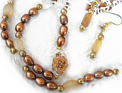 Pearl set with fire opals and aquamarines (brown)SE137