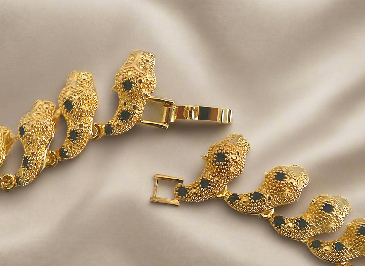 Parure panthère dorée aux yeux zirconia rubis NACRELUNE parure