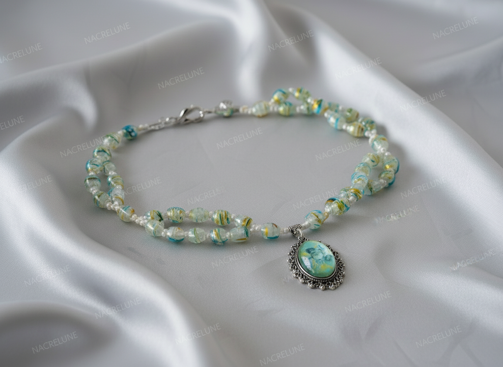 Parure en verre avec camée représentant des fleurs nacrelune.com parure