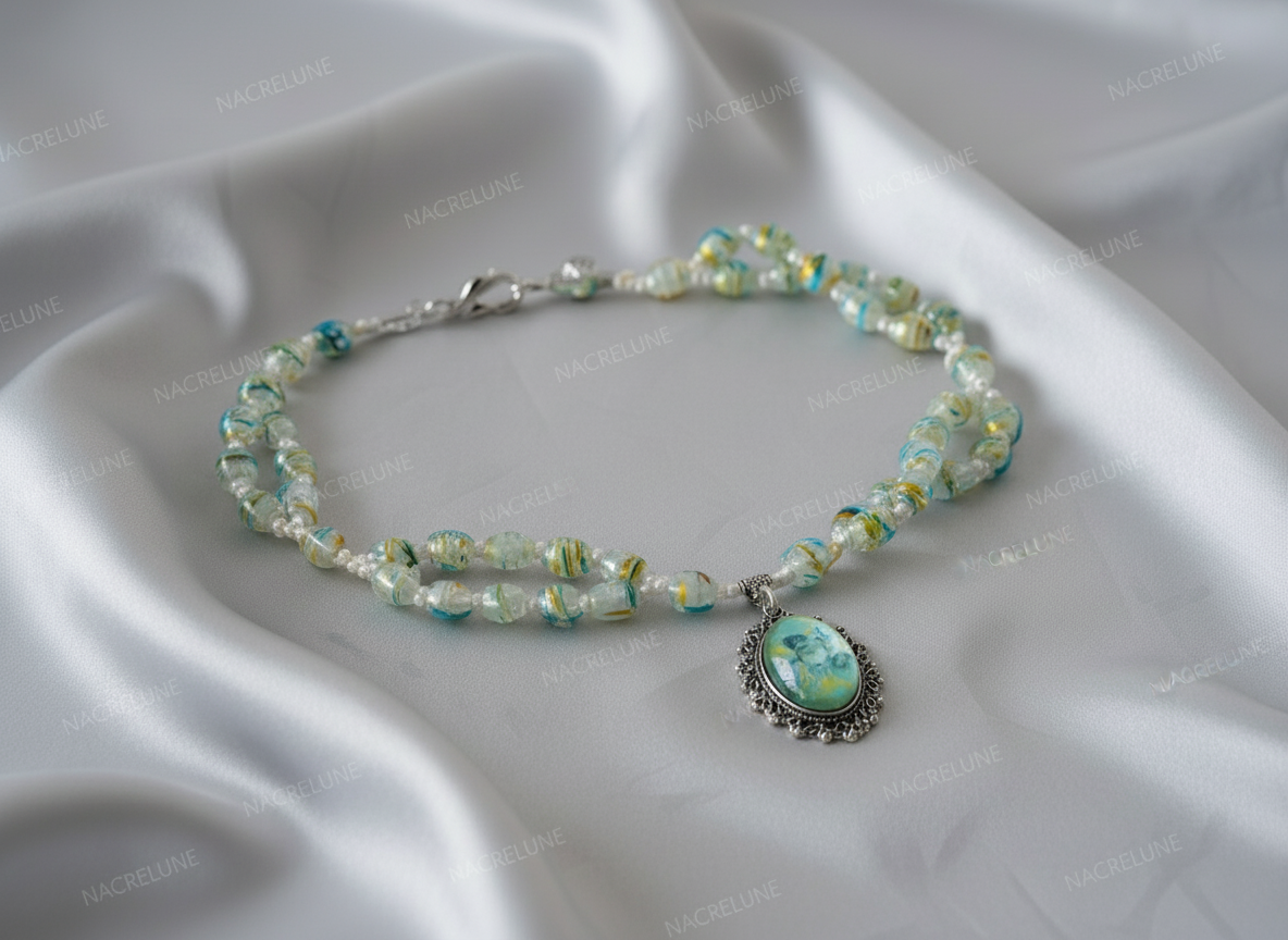 Parure en verre avec camée représentant des fleurs nacrelune.com parure