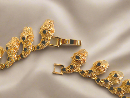 Parure panthère dorée aux yeux zirconia rubis