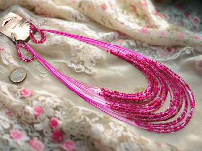 Parure en perles de rocaille, rose