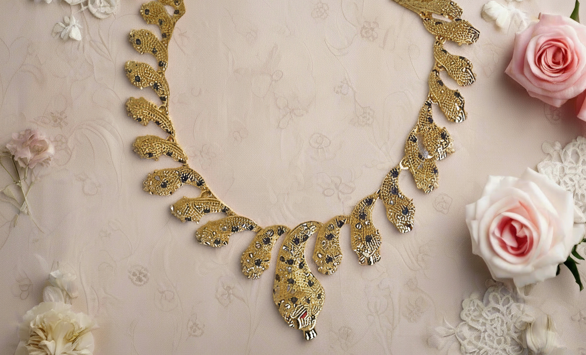 Parure panthère dorée aux yeux zirconia rubis NACRELUNE parure