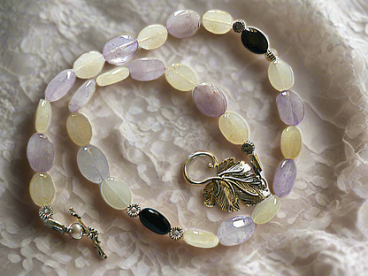 parure en perles naturelles d'améthystes citrines et onyx