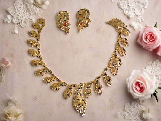 Parure panthère dorée aux yeux zirconia rubis