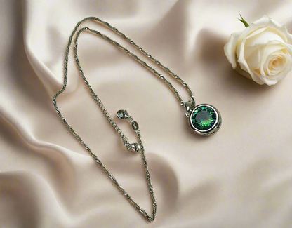 Pendentif en argent avec topaze taillée traitée mystique