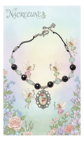 Aquamarine and genuine garnet bead necklace with a small flower fairy cameo