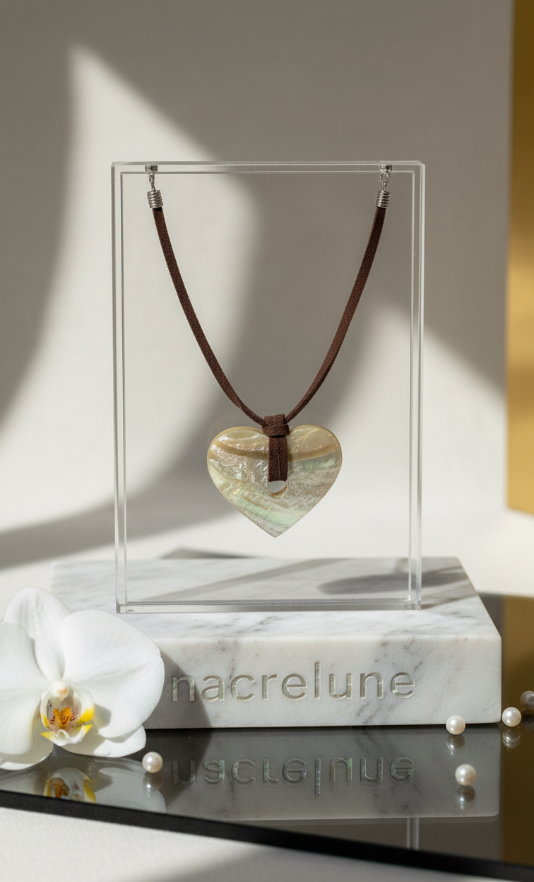 Genuine mother-of-pearl heart pendant on a leather cord