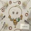 Parure en strass représentant des écureuils nacrelune.com parure