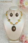 Jewelry set in genuine cultured pearls and acrylic beads with a glass cameo depicting flowers