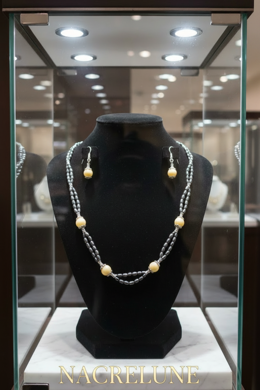Jewelry set made of small iridescent cultured pearls and polished citrines