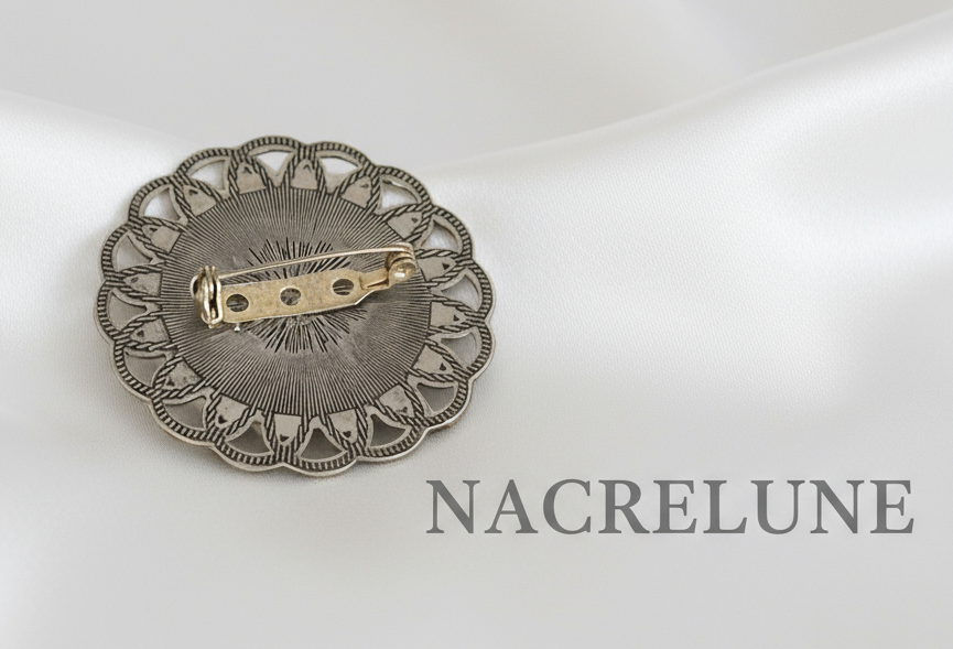 Broche camée de style steampunk NACRELUNE broche