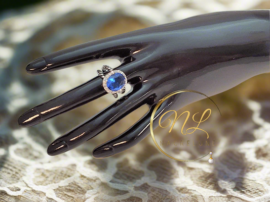 Bague en argent 925 avec  topaze bleue ovale
