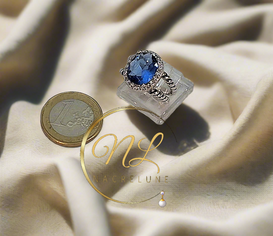 Bague en argent 925 avec  topaze bleue ovale