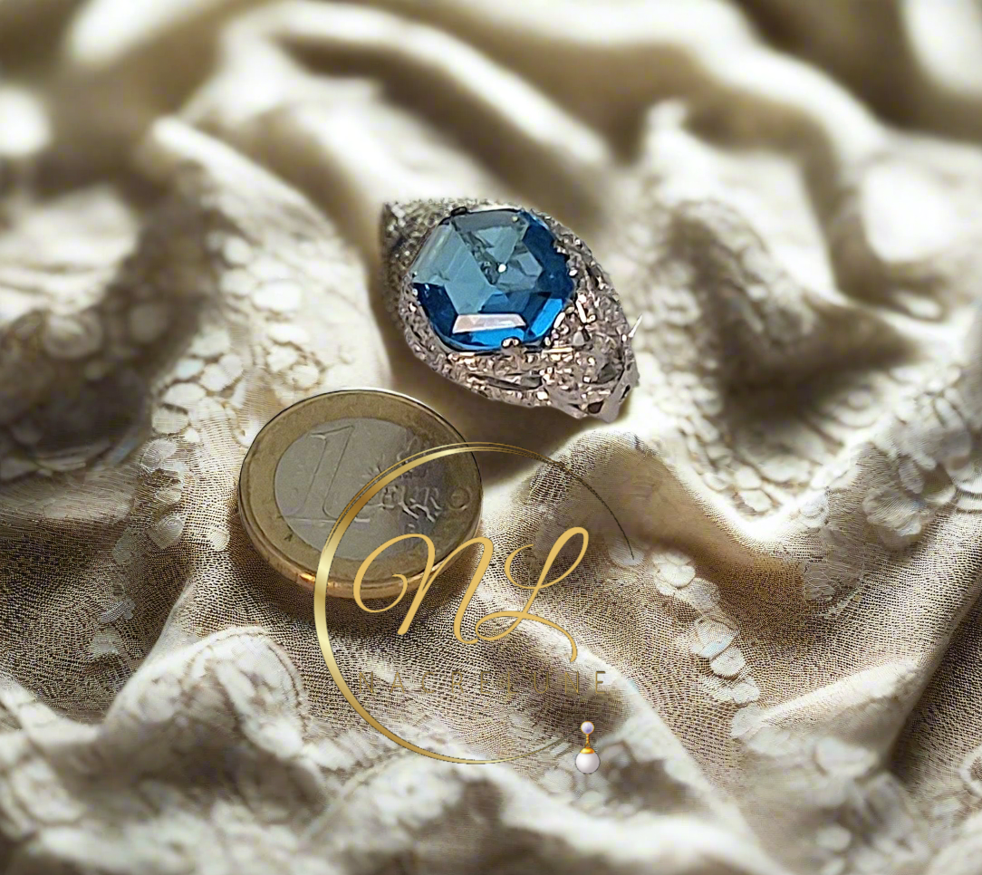 Bague argent avec topaze bleue