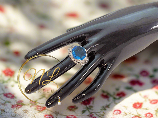 Bague argent avec topaze bleue