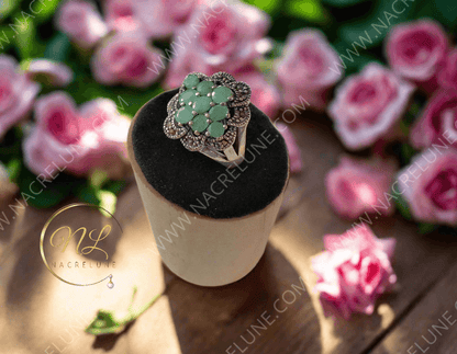 Bague en argent véritable et marcassites avec émeraudes vraies