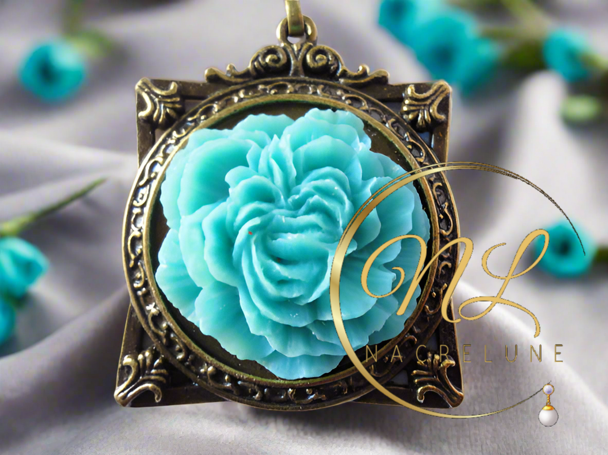 Pendentif cadre avec fleur, bleu turquoise