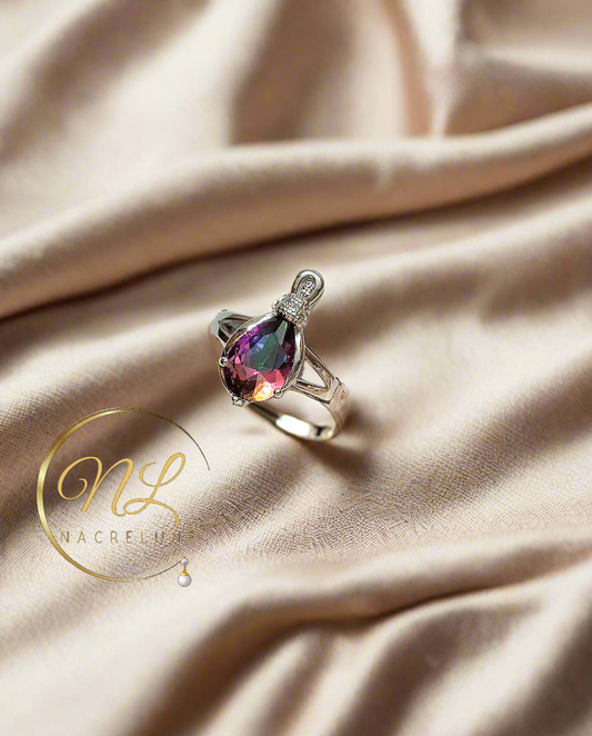 Bague en argent avec topaze taillée traitée