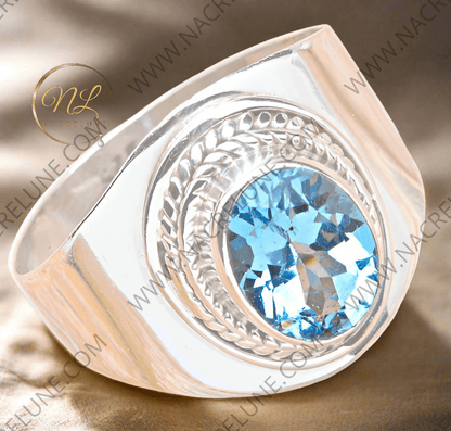 Bague en argent 925 avec topaze bleue
