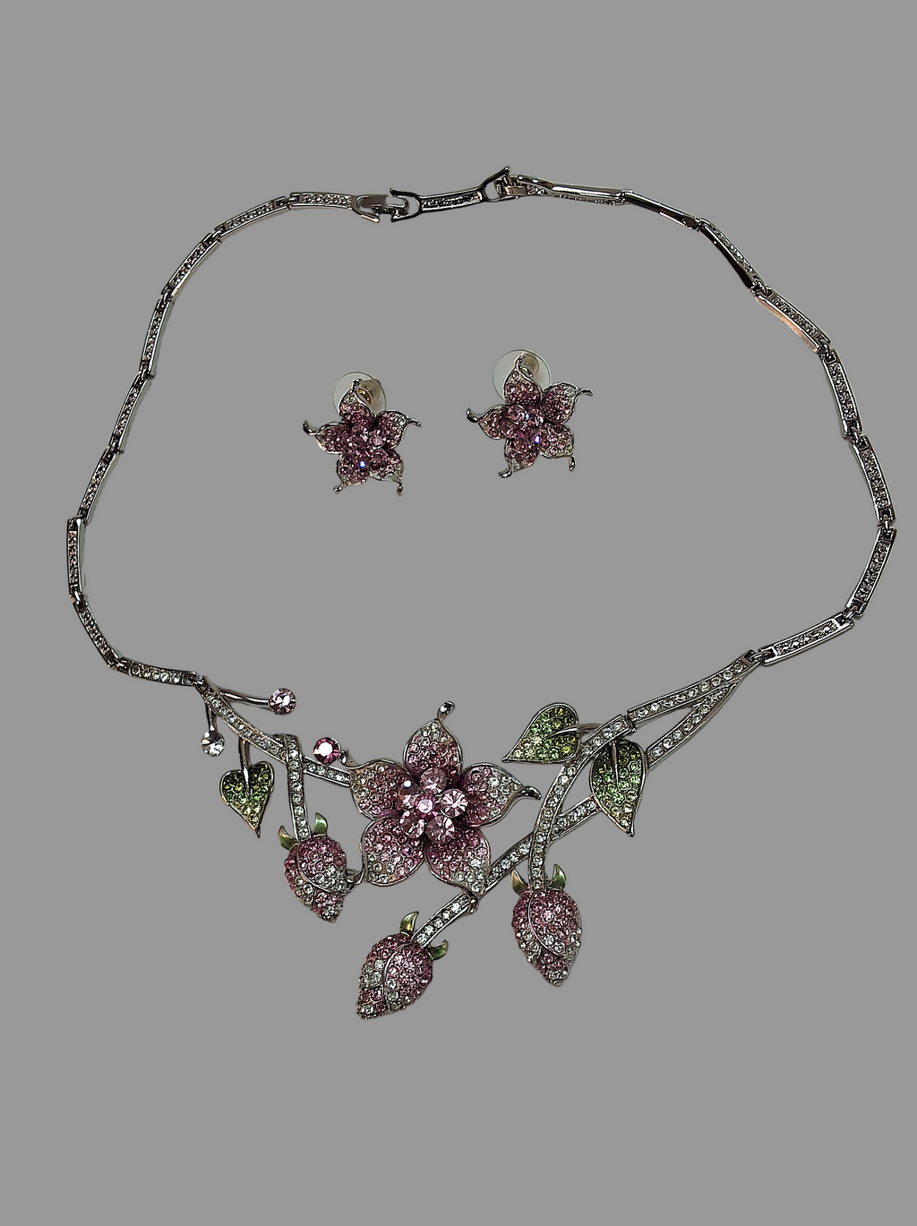 Parure en strass rose en forme de fleurs nacrelune.com parure