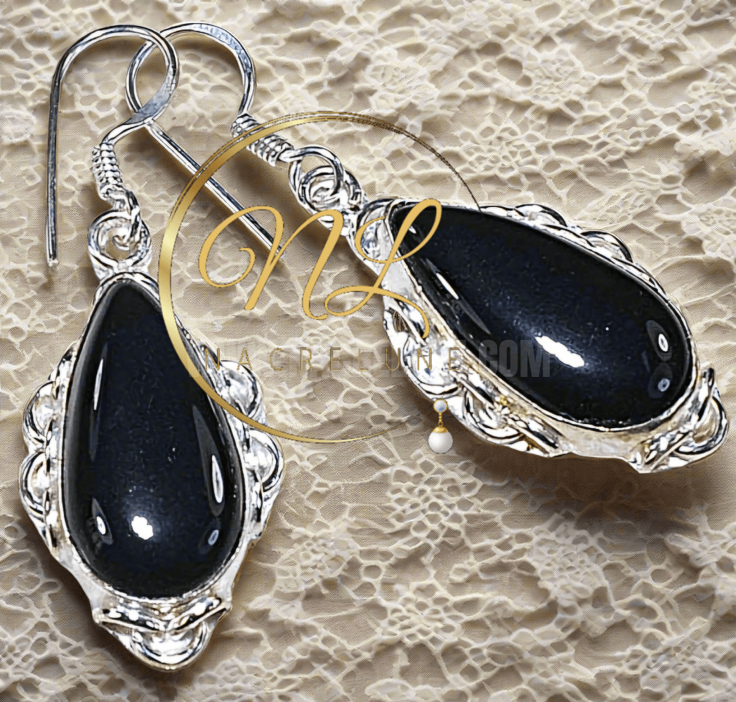 Boucles d'oreille en argent et onyx poli