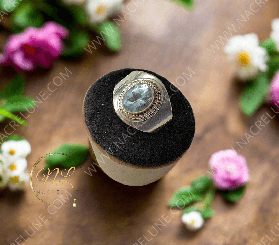 Bague en argent 925 avec topaze bleue