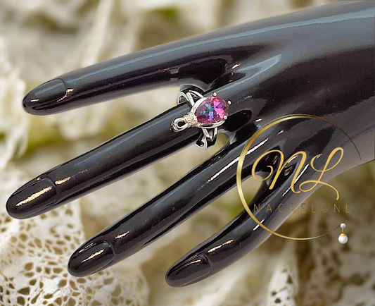 Bague en argent avec topaze taillée traitée