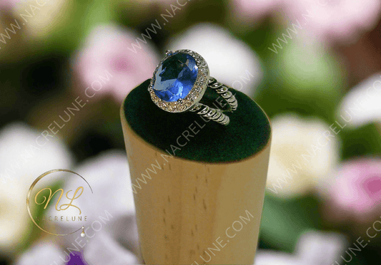 Bague en argent 925 avec topaze bleue ovale
