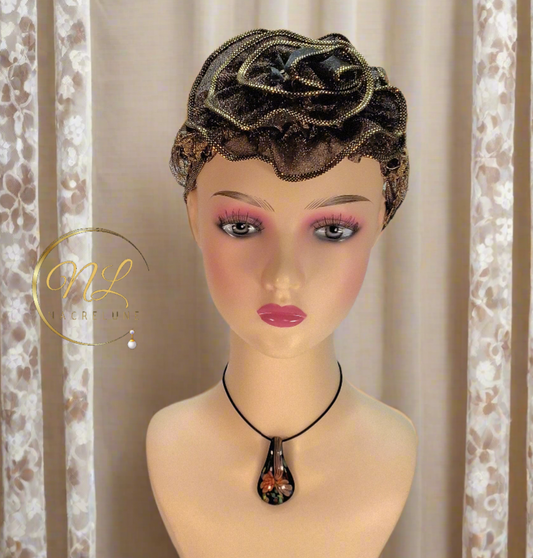 Pendentif en verre représentant une fleur colorée