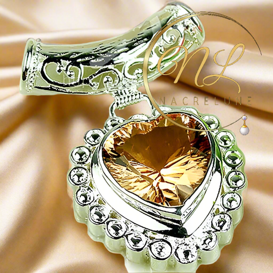 pendentif en argent en forme de coeur avec topaze