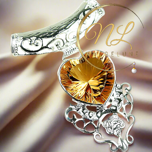 pendentif en argent en forme de coeur avec topaze