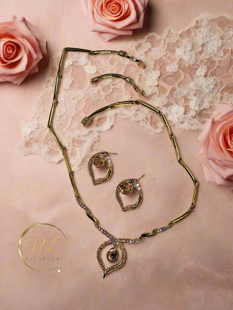 Parure stylisée en strass roses