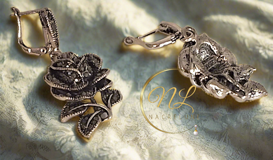 Boucles d’oreille en argent et marcassites en forme de rose